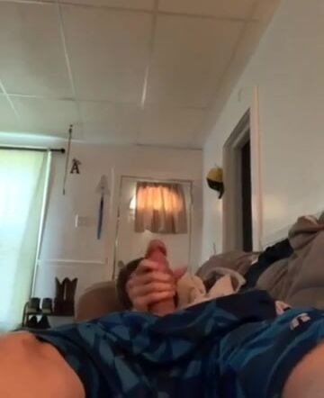 Twink jerking off in the living room
